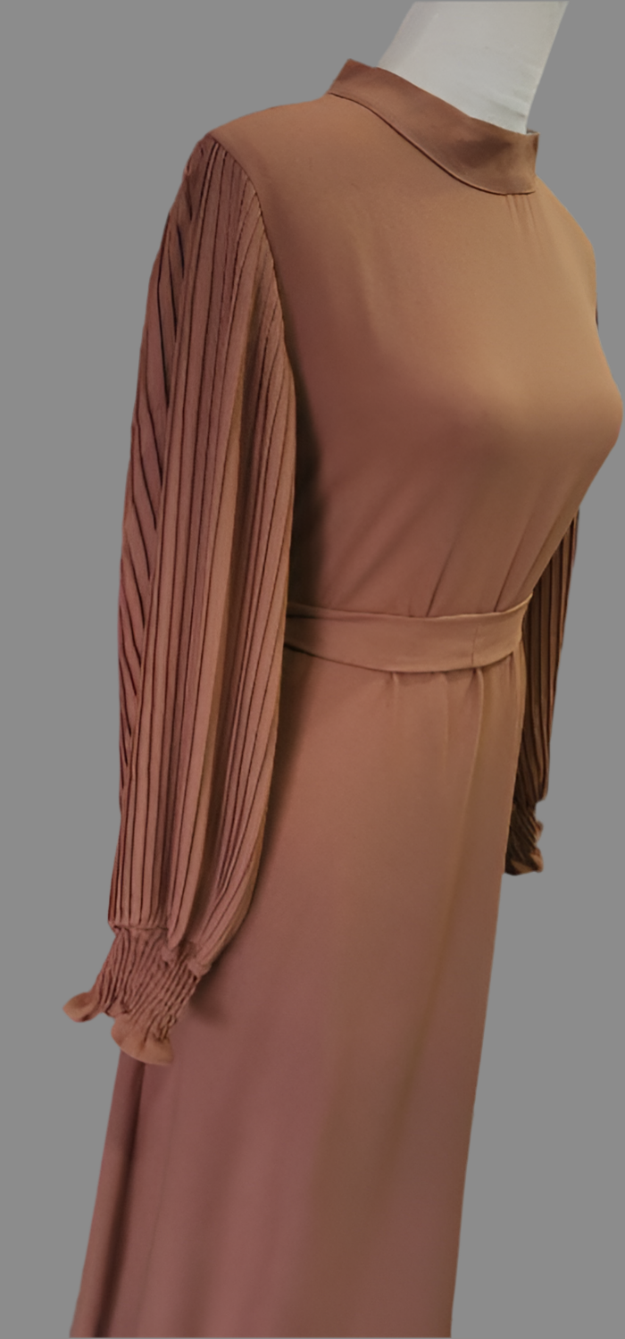 Brooch and belted Dress
