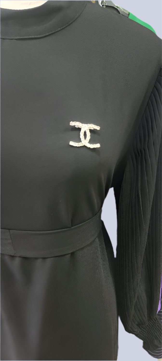 Brooch and belted Dress