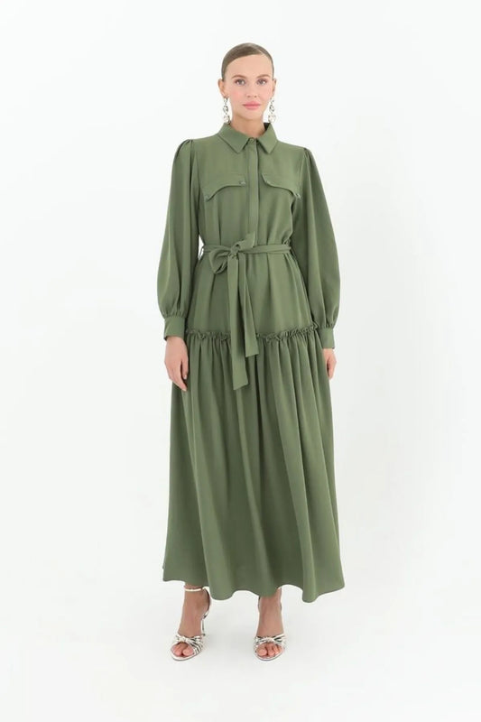 Green dress with a ruffled hem and half-buttoned design